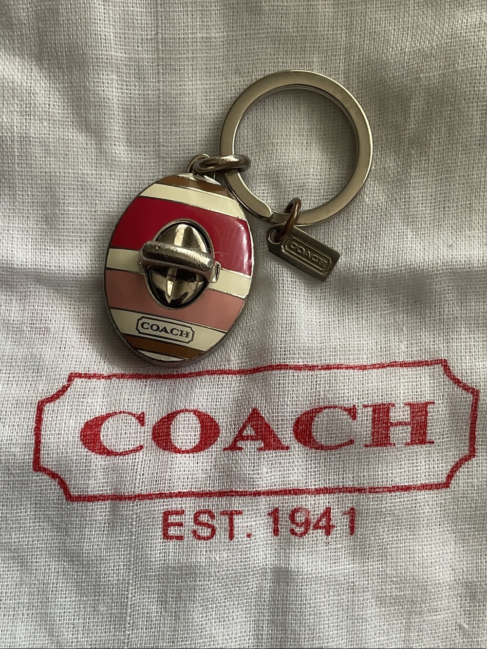 Coach Striped Enamel Turnlock Key Fob — Red, Pink & Cream
